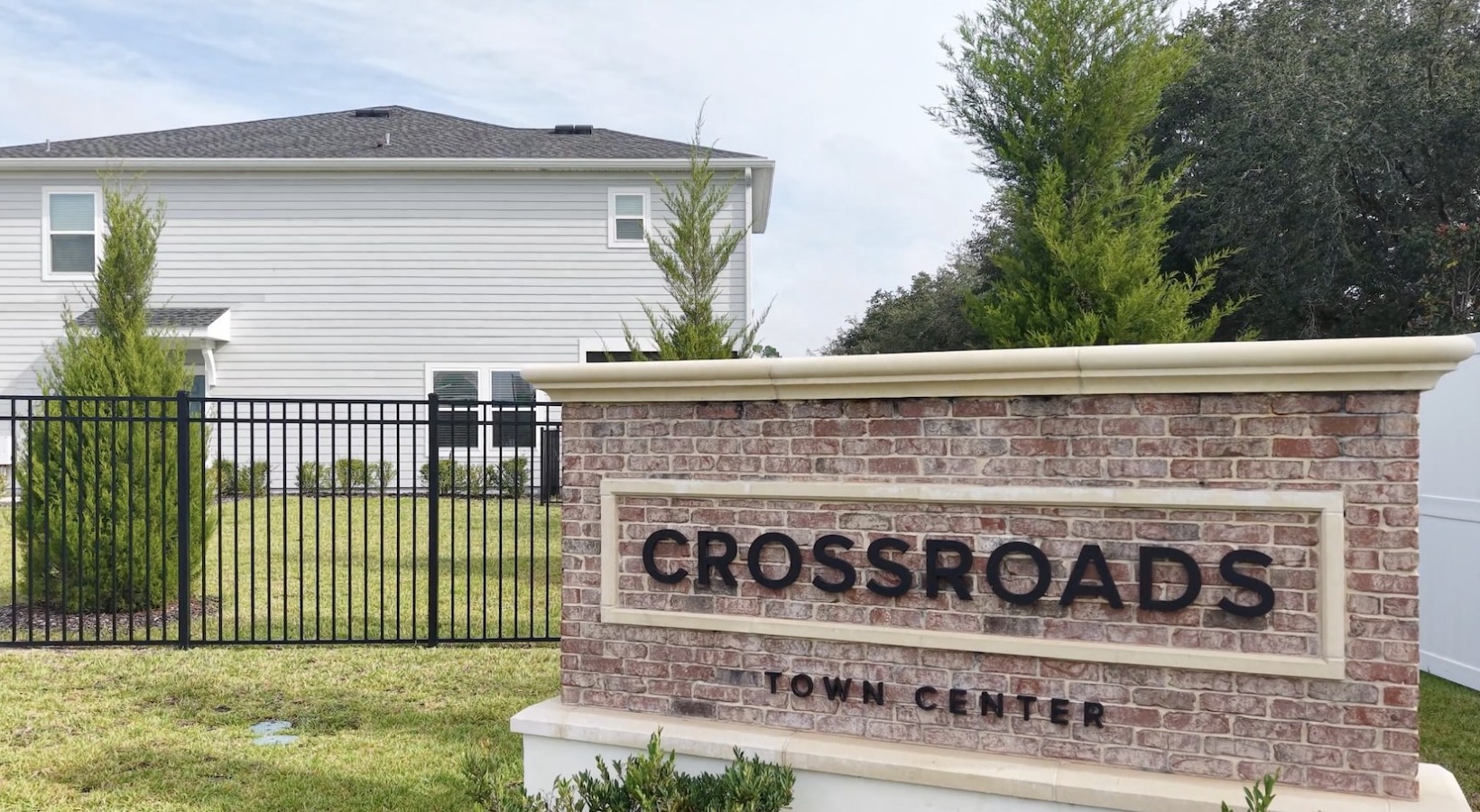 a sign in front of a building